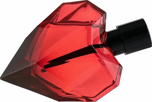 Red diamond-shaped perfume bottle with black cap on a white background