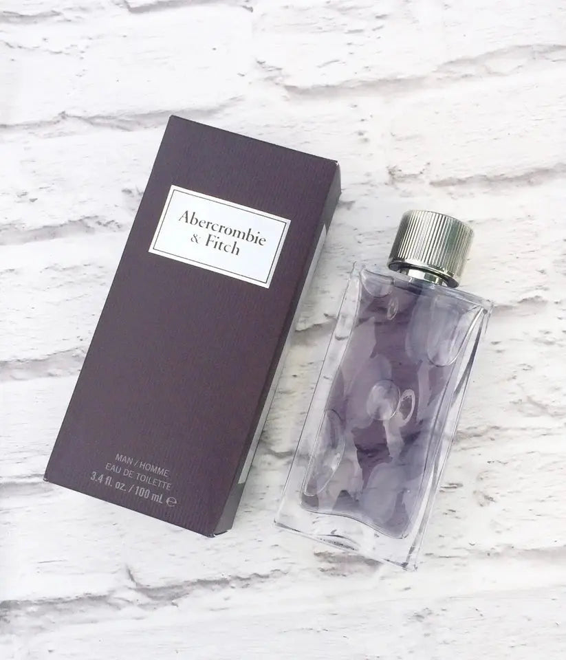 Abercrombie & Fitch perfume bottle and packaging on a marble surface