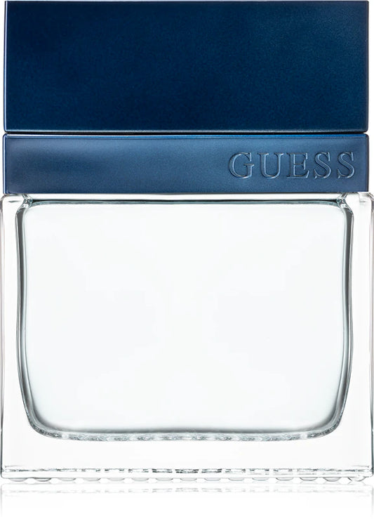 Guess perfume bottle with blue cap and clear glass body on a white background