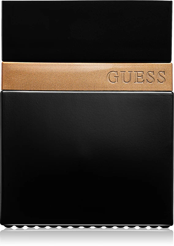 Black Guess perfume bottle with gold cap on a white background