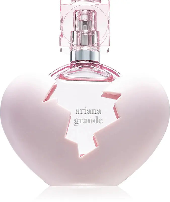 Heart-shaped Ariana Grande perfume bottle on a white background