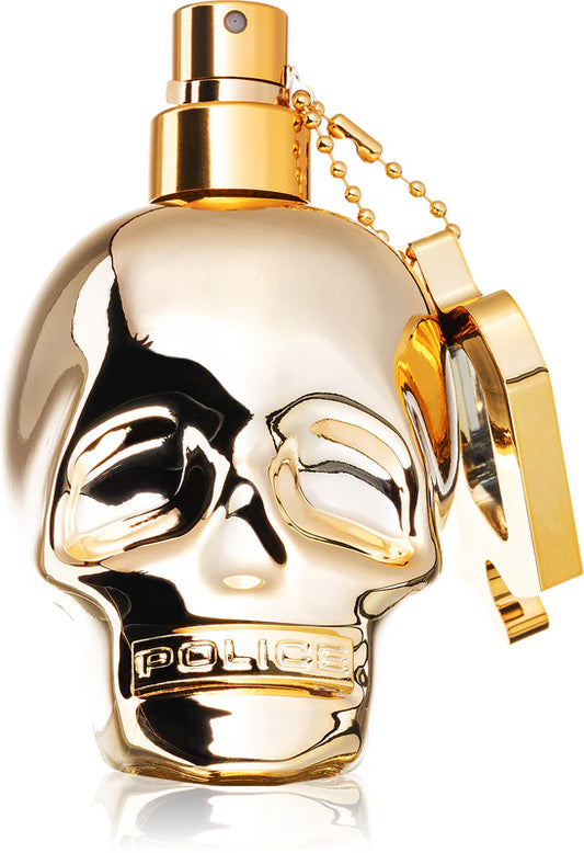 Gold skull-shaped perfume bottle with 'Police' branding on a white background