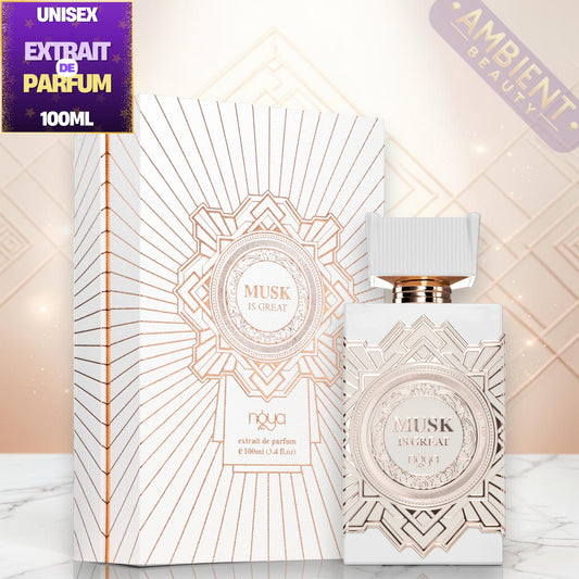 Perfume bottle and packaging with 'Musk Extrait' branding on a decorative background.